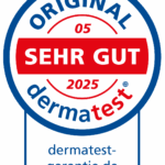 Ein rundes Siegel mit der Aufschrift ORIGINAL dermatest SEHR GUT 2025 und einer Website, dermatest-garantie.de, die auf eine hohe Produktbewertung hinweist.